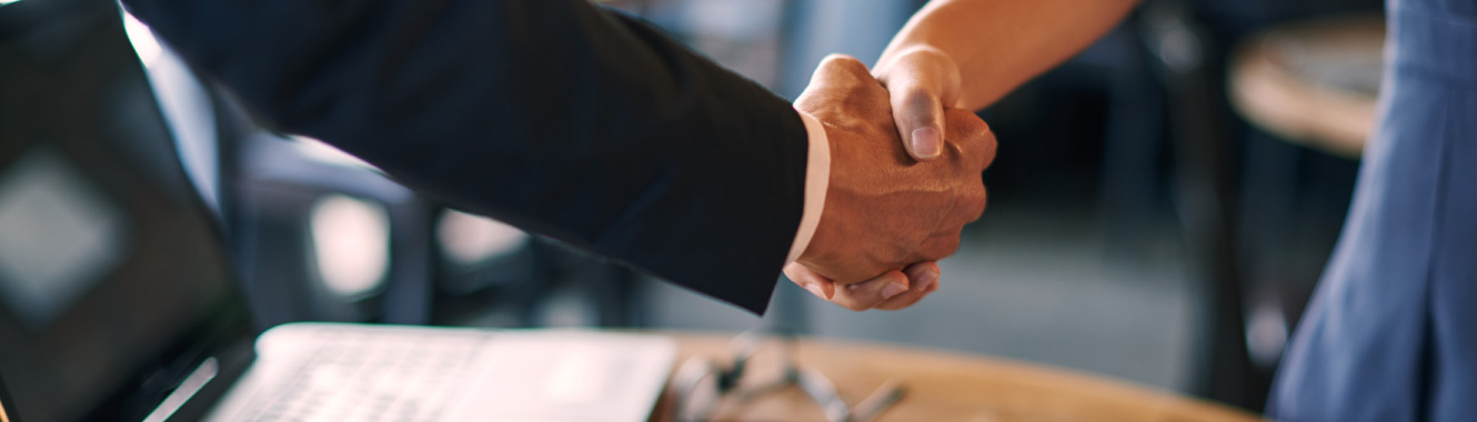 Business people shaking hands