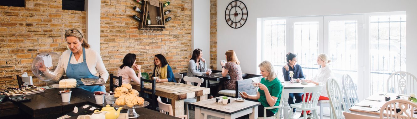 customers sitting in bakery shop